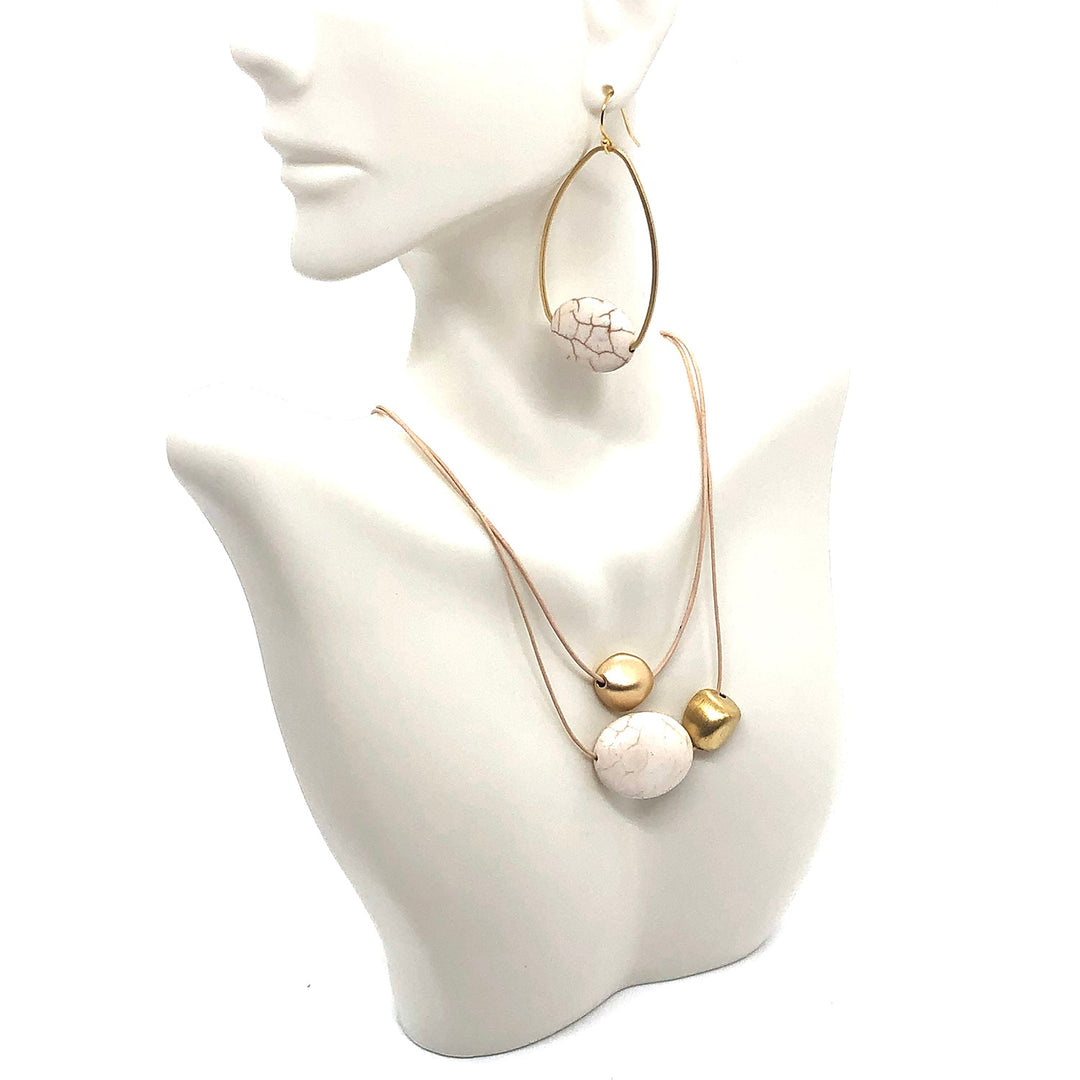 White Magnesite Oval With Matte Gold Bead Graduated Putty Leather Necklace