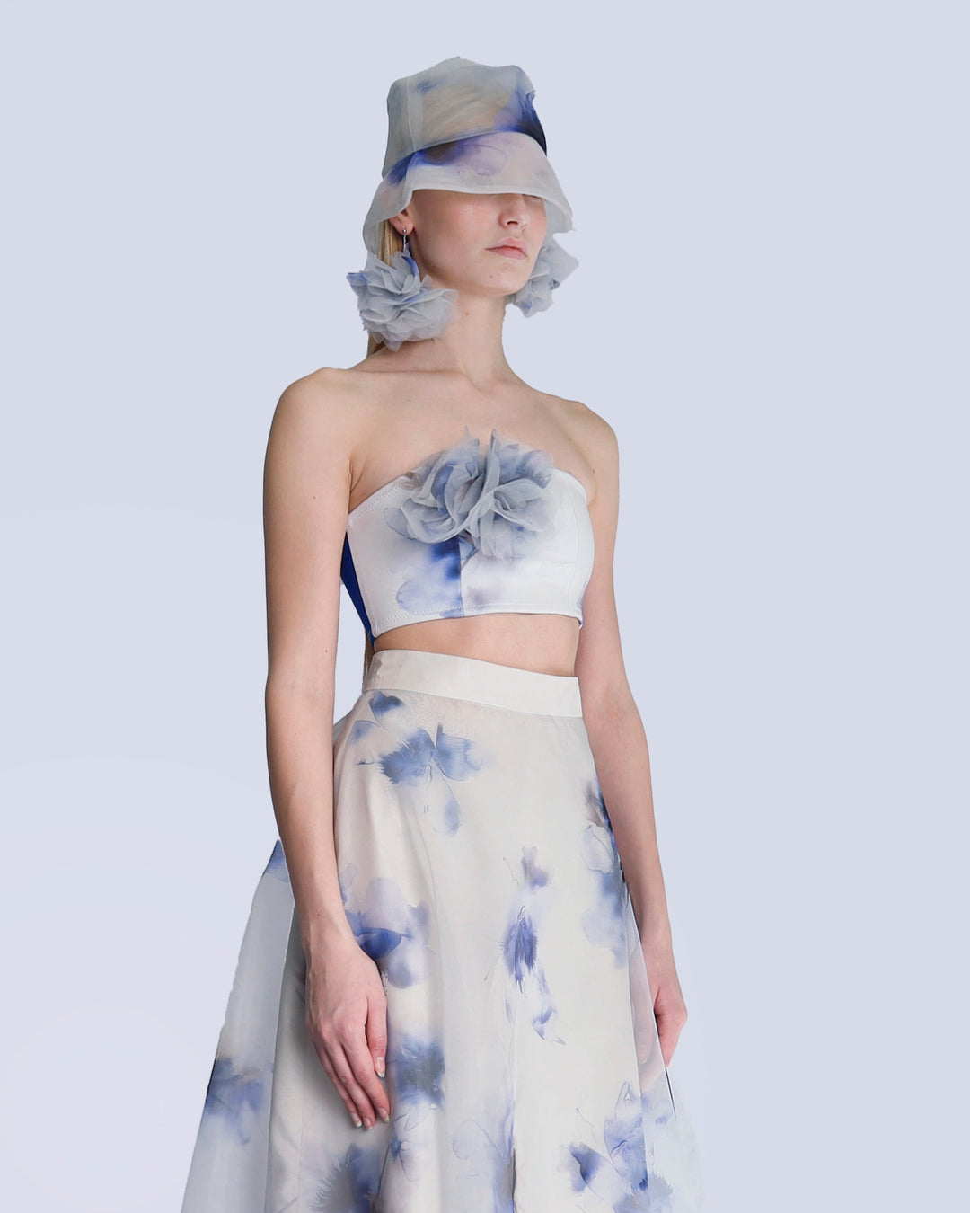 Maison Marie Saint Pierre | Skirt | JARINA | Aqua Lily Blue | Earring | JANAR | Aqua Lily Blue | Brooch | JUSTAR | Aqua Lily Blue