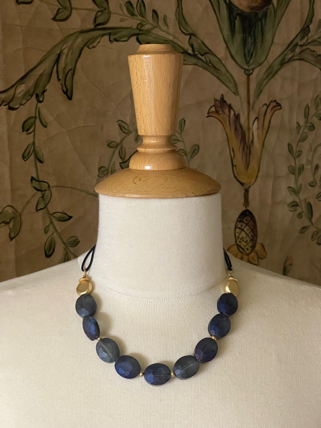 Matte Blue Crystal and Flat Matte Gold Nugget Necklace on Navy Linen