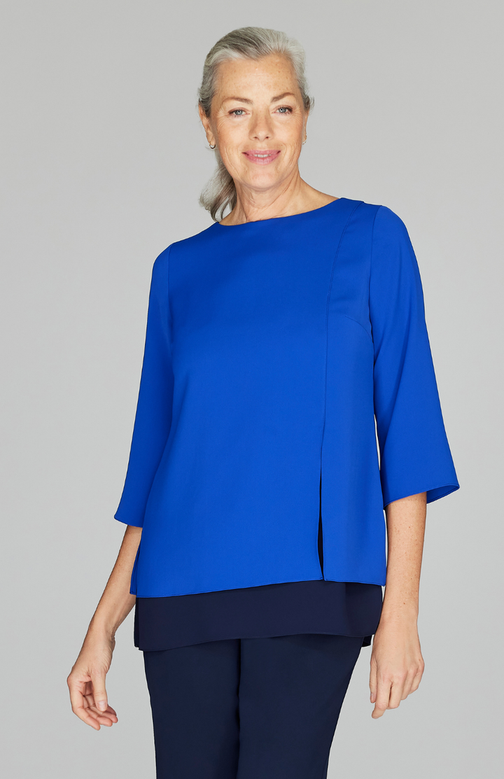 Fabienne is wearing Cobalt Midnight Combo in size XS.