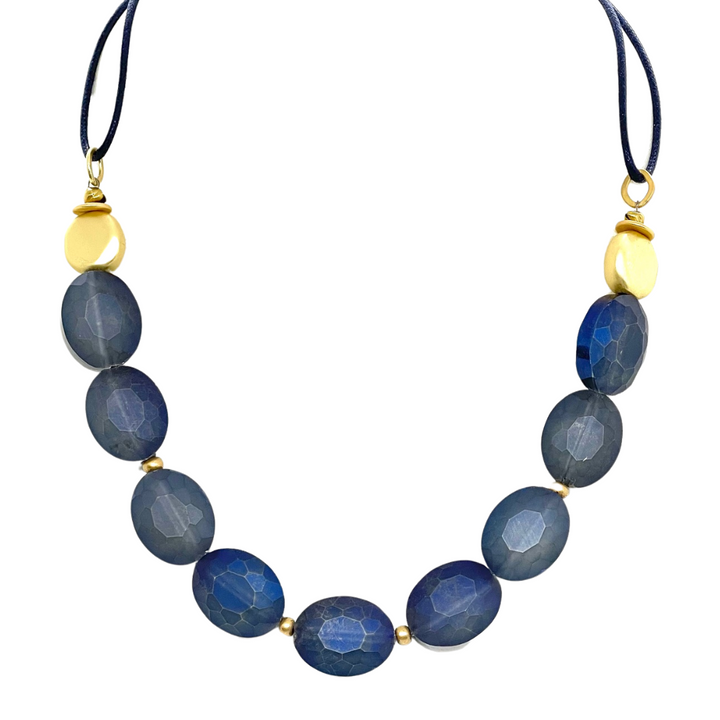 Matte Blue Crystal and Flat Matte Gold Nugget Necklace on Navy Linen