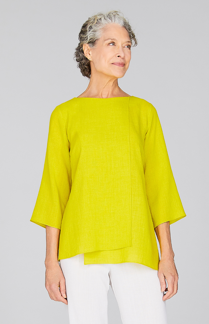 Nancy is wearing Citrus in XS.